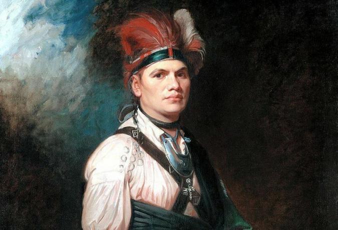 Joseph Brant en vestido nativo americano con tocado