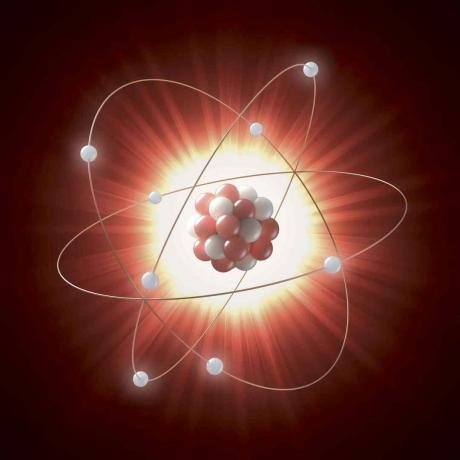 Ilustración de un núcleo atómico como una serie de círculos rojos y blancos, orbitados por electrones representados por círculos blancos.