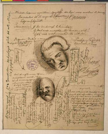 Página manuscrita cubierta con letra y garabatos de caras